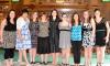 Students participating in the Gender and Women's Studies hooding ceremony